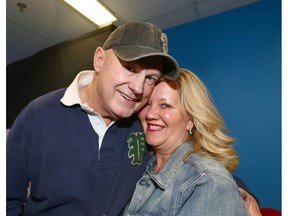 CJAY 92 radio morning show personality Gerry Forbes gets a kiss and a hug from his wife Shelley Bo Belli.