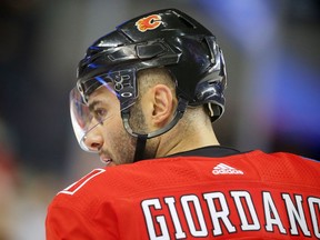 iCalgary Flames Mark Giordano during the pre-game skate before facing the New York Rangers in NHL hockey at the Scotiabank Saddledome in Calgary on Friday, March 2, 2018. Al Charest/Postmedia