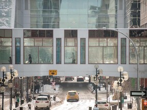 The Plus-15 system pulls off a few neat tricks. For one, it keeps winter at bay. For another, the network designed 
to connect downtown buildings has proved seriously divisive.