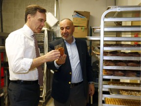 Finance Minister Bill Morneau vists The Desert Pita and Grill during his visit to Calgary on Wednesday.