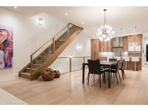 Stairs to the top level in this inner-city duplex show home by Maillot Homes.