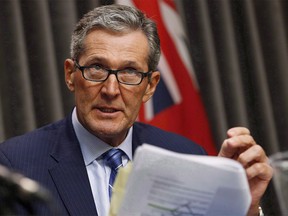 The Manitoba government has introduced new legislation to help children in care maintain their Indigenous customs and connections with family. Manitoba Premier Brian Pallister speaks at a news conference at the Manitoba Legislature in Winnipeg on November 7, 2017. THE CANADIAN PRESS/John Woods ORG XMIT: CPT141