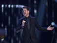 Host Michael Buble is shown on stage at the Juno Awards in Vancouver, Sunday, March, 25, 2018.