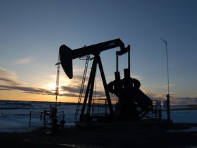 A well head is seen under a sunrise in the British Columbia North Peace region in this undated handout photo.