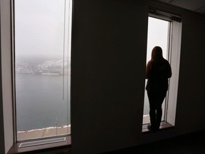 A St. John's woman, whose identity is concealed to protect her grandchildren, is raising them because their father, her son, and their mother are addicted to drugs. She looks out over the St. John's harbour on Monday March 12, 2018. The opioid crisis across Canada is throwing many grandparents into the demanding role of caregiver at a time when they expected to enjoy more financial freedom, travel and relaxation.