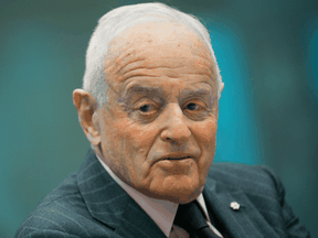 Peter Munk, founder and chairman Barrick Gold Corp., speaks during an interview in New York in 2014. The company Munk founded announced he died peacefully in Toronto Wednesday. He was 90.