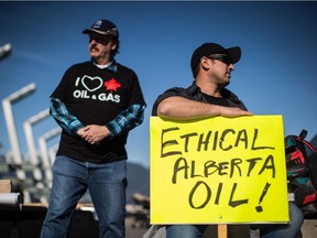 People rally in support of the Kinder Morgan Trans Mountain pipeline expansion in Vancouver on Saturday.