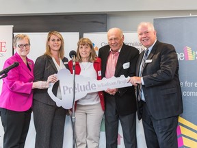 A few of the Resolve Campaign partners: Diana Krecsy, president and CEO, Calgary Homeless Foundation; Bernadette Majdell, CEO, HomeSpace; Shelley Heartwell  CEO of The Alex; Cal Wenzel, CEO of Shane Homes Group of Companies; and Alan Norris, President and CEO, Brookfield Residential Properties and Chair of the Resolve Campaign at an event celebrating the opening of Prelude at Radisson Heights.