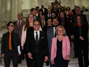 Joe Ceci, President of the Treasury Board and Minister of Finance walks down the steps in the Alberta Legislature with Premier Rachel Notely after delivering Budget 2018 on Thursday, March 22, 2018  in Edmonton.