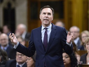 Federal Finance Minister Bill Morneau rises during Question Period in the House of Commons on Thursday, March 1, 2018.