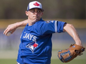 Toronto Blue Jays pitcher Aaron Sanchez throws live batting practice at spring training in Dunedin, Fla., on Feb. 20.