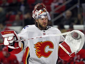 Flames goaltender Mike Smith practiced in Buffalo on March 6, 2018, but says it's too early to say when he'll be cleared to play.