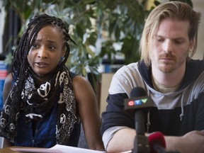 "Dana" a pseudonym to protect her privacy, speaks at a press conference at CRARR offices in Montreal April 21, 2018, about her and her and her boyfriend Brian Mann, right, experiences as a biracial couple being the target of what they allege was racial profiling on April 7, at 10 in the morning by Montreal police.