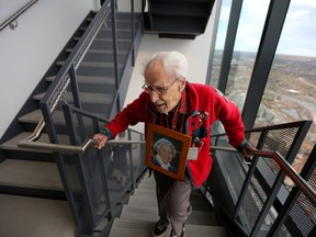 Richard Guy, 101, climbs the last few flights of stairs during the Alberta Wilderness Association Climb for Wilderness at the Bow Building in Calgary on Saturday April 21, 2018.