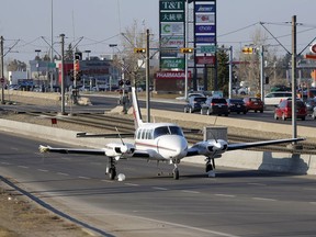 A small plane made an emergency landing on 36th Street N.E. on April 25, 2018.