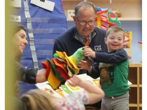 Rod Spittle, Canadian PGA TOUR Champions player, reads to children at Calgary's PREP program in Calgary, on Thursday April 26, 2018. Leah Hennel/Postmedia