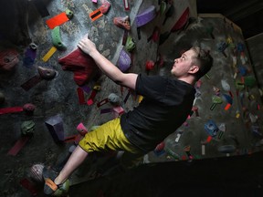 Dawson Beckett, instructor at Crux in Calgary, practises on April 6, 2018. Leah Hennel/Postmedia