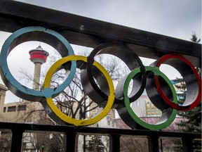 Readers question the value of bidding for a second Winter Olympic Games for the city.