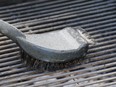 A barbecue brush in action.