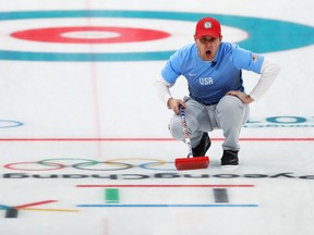 In this Feb. 22 file photo, U.S. skip John Shuster curls at the Pyeongchang Olympics.