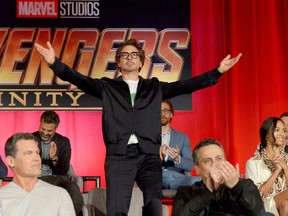 From left, actors Josh Brolin, Mark Ruffalo, Robert Downey Jr., Tom Hiddleston, director Joe Russo, and actor Zoe Saldana attend the Global Press Conference at the Avengers: Infinity War Press Junket in Los Angeles.