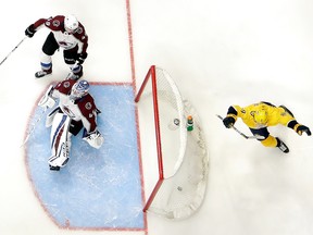 Nashville Predators left wing Filip Forsberg (9), of Sweden, celebrates after scoring his second goal of the game against Colorado Avalanche goaltender Jonathan Bernier (45), during the third period in Game 1 of an NHL hockey first-round playoff series Thursday, April 12, 2018, in Nashville, Tenn. The Predators won 5-2. (AP Photo/Mark Humphrey)