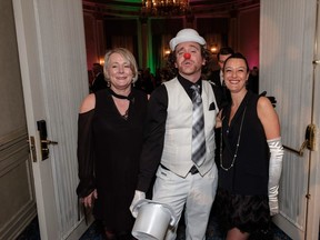 Cal 0414 Jazz 1 More than 550 guests packed the Fairmont Palliser Hotel Mar 17 to attend one of the best parties there is- Decidedly Jazz Danceworks' (DJD) annual Black and White Ball. Pictured from left are DJD's executive director Kathi Sundstrom, professional clown Chad Bryant and DJD board member and ball chair Claire Auroi.