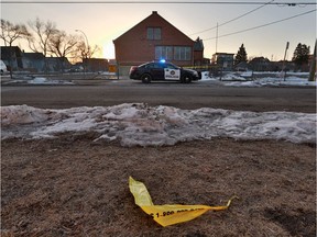 Police guard the scene of an officer-involved shooting in Bridgeland earlier this month.