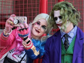 Deidra Jackson and Jay Hyslip pause to take a selfie during the Calgary Expo at Stampede Park on Saturday April 28, 2018. Gavin Young/Postmedia