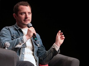Actor Elijah Wood takes part in a discussion at the Calgary Expo at Stampede Park on Sunday.