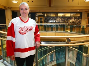Cassidy Trotter, student in health and phys ed at MRU, poses in a hockey jersey on Thursday, April 12, 2018.