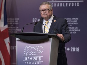 Canada's Minister of Public Safety Ralph Goodale addresses the media during a press briefing in Toronto on Monday, April 23, 2018.