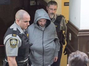 Nicholas Butcher arrives at provincial court in Halifax on Tuesday, April 12, 2016. The second-degree murder trial of Nicholas Butcher resumes today after the 36-year-old law school graduate testified that he fatally stabbed Montreal-born yoga instructor Kristin Johnston by accident. Butcher told the 14-member jury in Nova Scotia Supreme Court last week that the pair had been sleeping at Johnston's home on March 26, 2016, when he awoke to someone stabbing him in the throat with a knife.