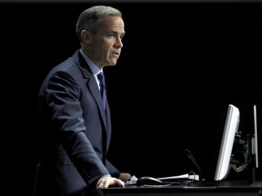Bank of England Governor Mark Carney, who had to cancel his attendance at the Scottish Economics Conference due to the severe weather conditions, delivers his speech via a live feed from Bloomberg HQ in central London, Friday March 2, 2018. Bank of England governor Mark Carney says cryptocurrencies aren't a risk to the financial state, but he thinks they will be subject to some form of regulation.
