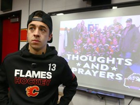 Calgary Flames Johnny Gaudreau talks to media in the locker room in Calgary on Saturday, April 7, 2018 before the team's last home gpoke ame. Gaudreau also spoke to media about the Humboldt bus crash. Jim Wells/Postmedia