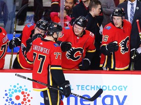 Calgary Flames Mark Jankowski celebrates with teammates after scoring against the Vegas Golden Knights at the Scotiabank Saddledome Saturday, April 7, 2018.