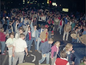 Were you — or your parents — at the biggest party in Calgary in 1986? Thousands crowded Electric Avenue (11th Avenue S.W.) to celebrate the Flames' first playoff series victory over the Oilers on April 30, 1986. Postmedia archives.