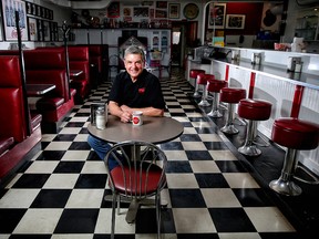 Evelyn's Memory Lane Cafe in High River was a gathering place for locals during the 2013 flood. Owner Hubert Aumeier poses for a photo on June 4, 2018.