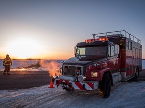 Emergency crews block the highway near where a bus carrying the Humboldt Broncos was struck by a semi north of Tisdale, Sask., Saturday on April 7, 2018.