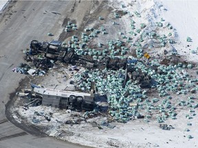 The wreckage of a fatal crash outside of Tisdale, Sask., is seen Saturday, April, 7, 2018. A bus carrying the Humbolt Broncos hockey team crashed into a truck en route to Nipawin for a game Friday night killing 14 and sending over a dozen more to the hospital.