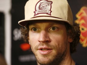 Calgary Flames Mike Smith during green garbage bag day at the Scotiabank Saddledome in Calgary, Alta., on Monday, April 9, 2018. Darren Makowichuk/Postmedia