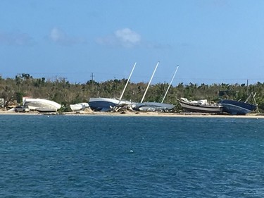 Sailboats in Trellis Bay on Tortola were lifted and scattered across the beach when Hurricane Irma struck the British Virgin Islands in 2017.  Photo, Michele Jarvie