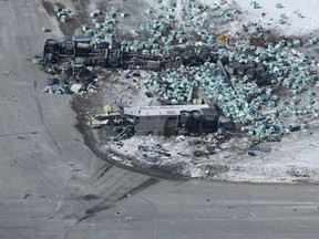 The wreckage of a fatal crash outside of Tisdale, Sask., is seen Saturday, April, 7, 2018. A bus carrying the Humboldt Broncos hockey team crashed into a truck en route to Nipawin for a game Friday night killing 14 and sending over a dozen more to the hospital.