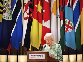 Britain's Queen Elizabeth II speaks during the formal opening of the Commonwealth Heads of Government Meeting in the ballroom at Buckingham Palace in London, Thursday April 19, 2018.