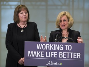 Premier Rachel Notley talks about new legislation giving Alberta the power to control the oil and gas resources that belong to all Albertans as Energy Minister Margaret McCuaig-Boyd listens on Monday, April 16, 2018 in Edmonton.  Greg  Southam / Postmedia