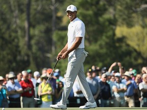 Tiger Woods reacts on the 17th hole during a practice round prior to the start of the 2018 Masters Tournament at Augusta National Golf Club on April 3, 2018 in Augusta, Georgia.