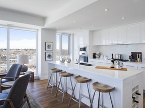 Residents enjoy magnificent views in Calgary’s first CresseyKitchen, maximizing space with its French-door refrigerator, gas cooktops and built-in microwave, wall oven and wine rack.