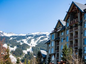 The Pan Pacific Whistler Village Centre hotel stands in front of Vail Resorts Inc. Whistler Blackcomb ski mountain in Whistler, British Columbia, Canada, on Friday, April 27, 2018.