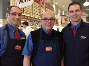 Doug Lovsin, left, with his brothers Mike Lovsin and Ken Lovsin, who also have management jobs at Freson Bros., at the company's Fresh Food Market in Stony Plain in 2013.