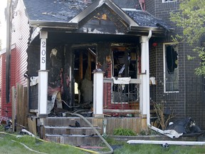 The scene of an early morning house fire on Citadel Bluff Close in Calgary on Friday May 25, 2018. Leah Hennel/Postmedia